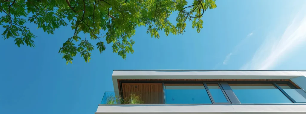 a stunning exterior view of a modern custom home in toronto, showcasing sleek architecture and lush landscaping under a bright blue sky, symbolizing quality craftsmanship and homeowner satisfaction.